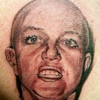 Think Before You Ink: A Gallery of Truly Awful Band Tattoos