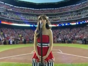 Watch Zooey Deschanel Sing The National Anthem at the World Series