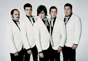 The Hives team with Cyndi Lauper for "A Christmas Duel"