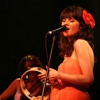 Watch Ben Gibbard and Zooey Deschanel Sing at a Baseball Game