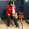Julian Koster and his singing saw play the <em>Paste</em> studio