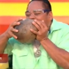 Man Husks Coconuts with His Teeth