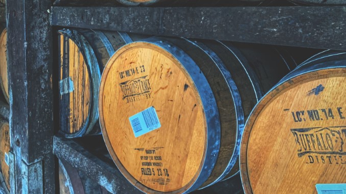 josh-collesano-unsplash-bourbon-barrels.jpg