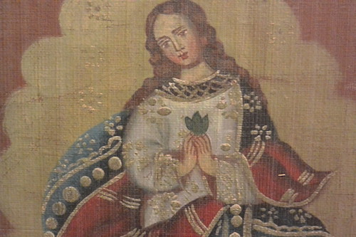 Mary holding a coca leaf.JPG