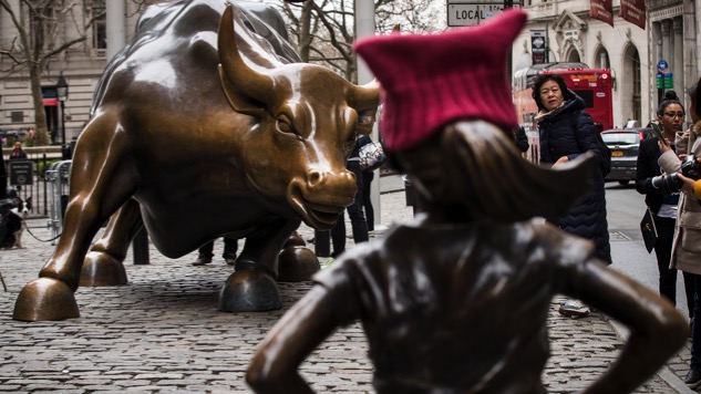 Statue of Little Girl Stares Down Wall Street's Charging Bull