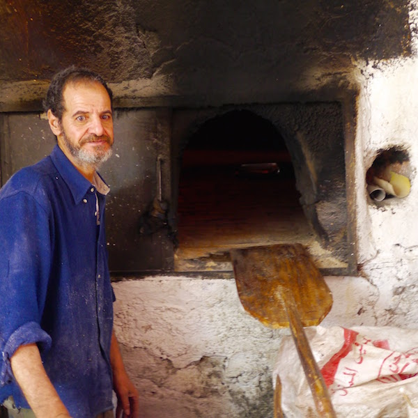 The baker at the faraan, Moulay Idriss. Photo by Johanna Read TravelEater.net.jpg